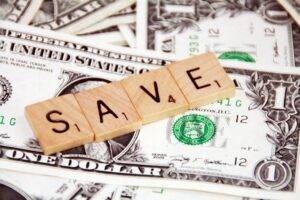 Save money scrabble letters over money